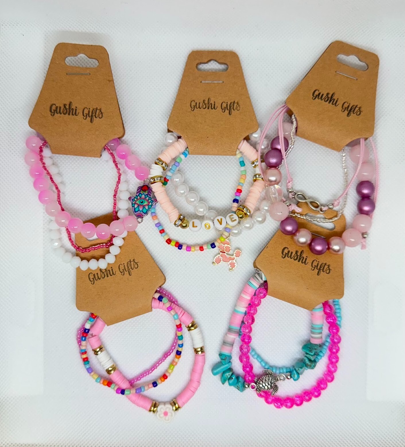 5 Sets of Handmade Beaded Bracelets with Charms