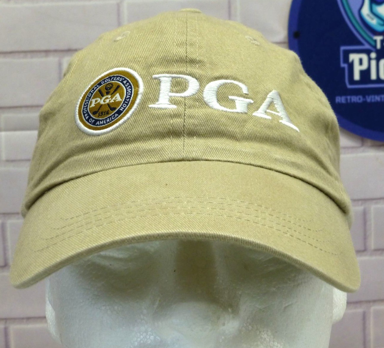 PGA Khaki Adjustable Golf Hat By Imperial Sports With Embroidered Logo