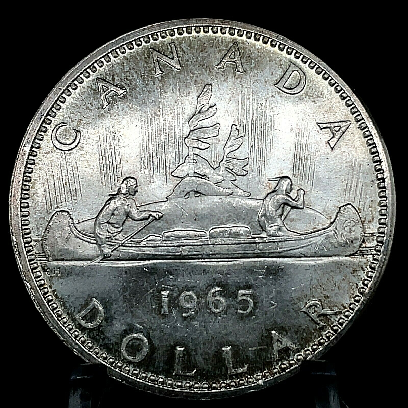 1965 PL Unc. $1 Canada Dollar .800 Silver Type 2 Small Beads Blunt 5.