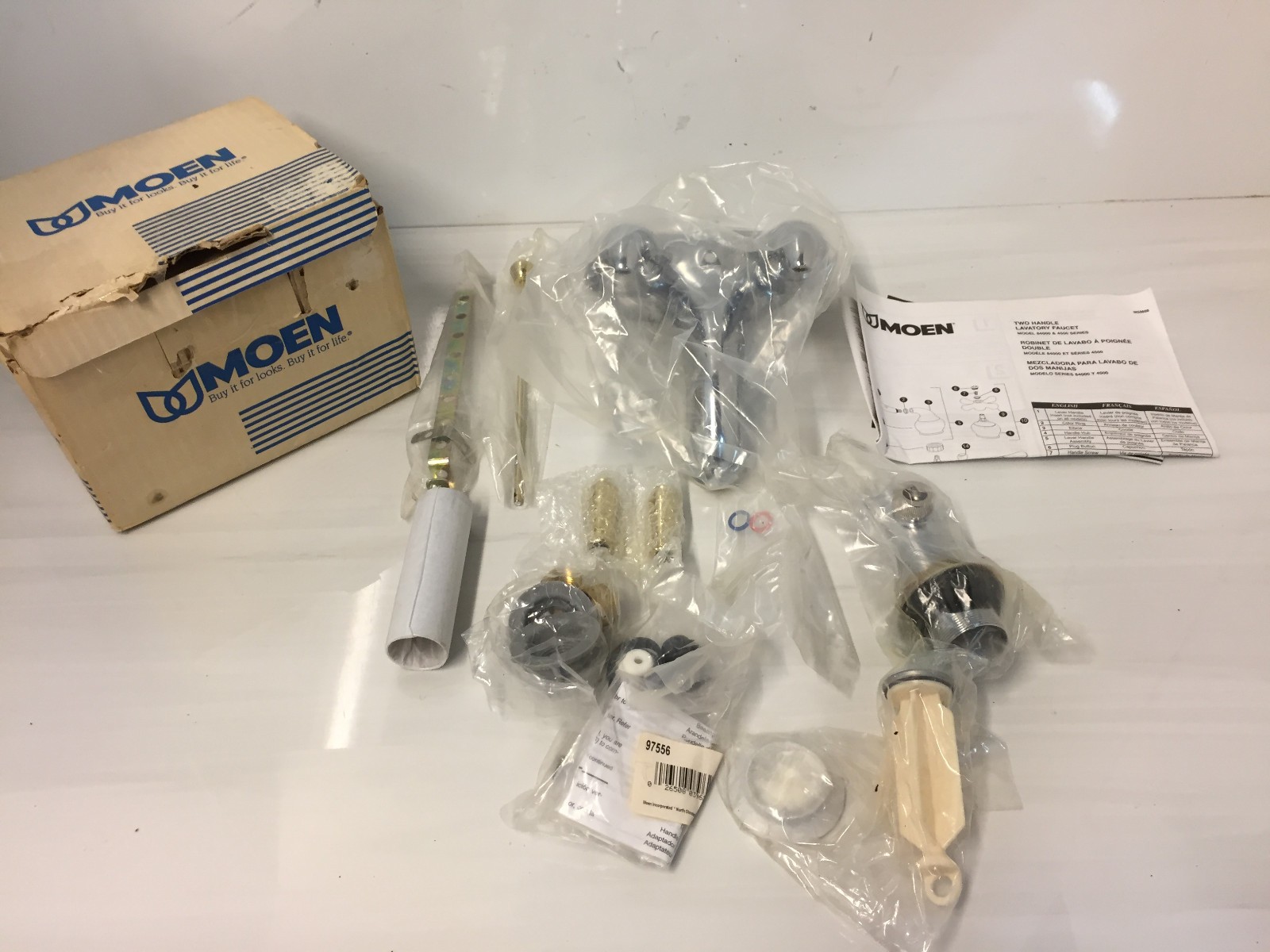 Moen Monticello 4551CP Chrome/Polished Brass Two-Handle Low Arc Bathroom Faucet