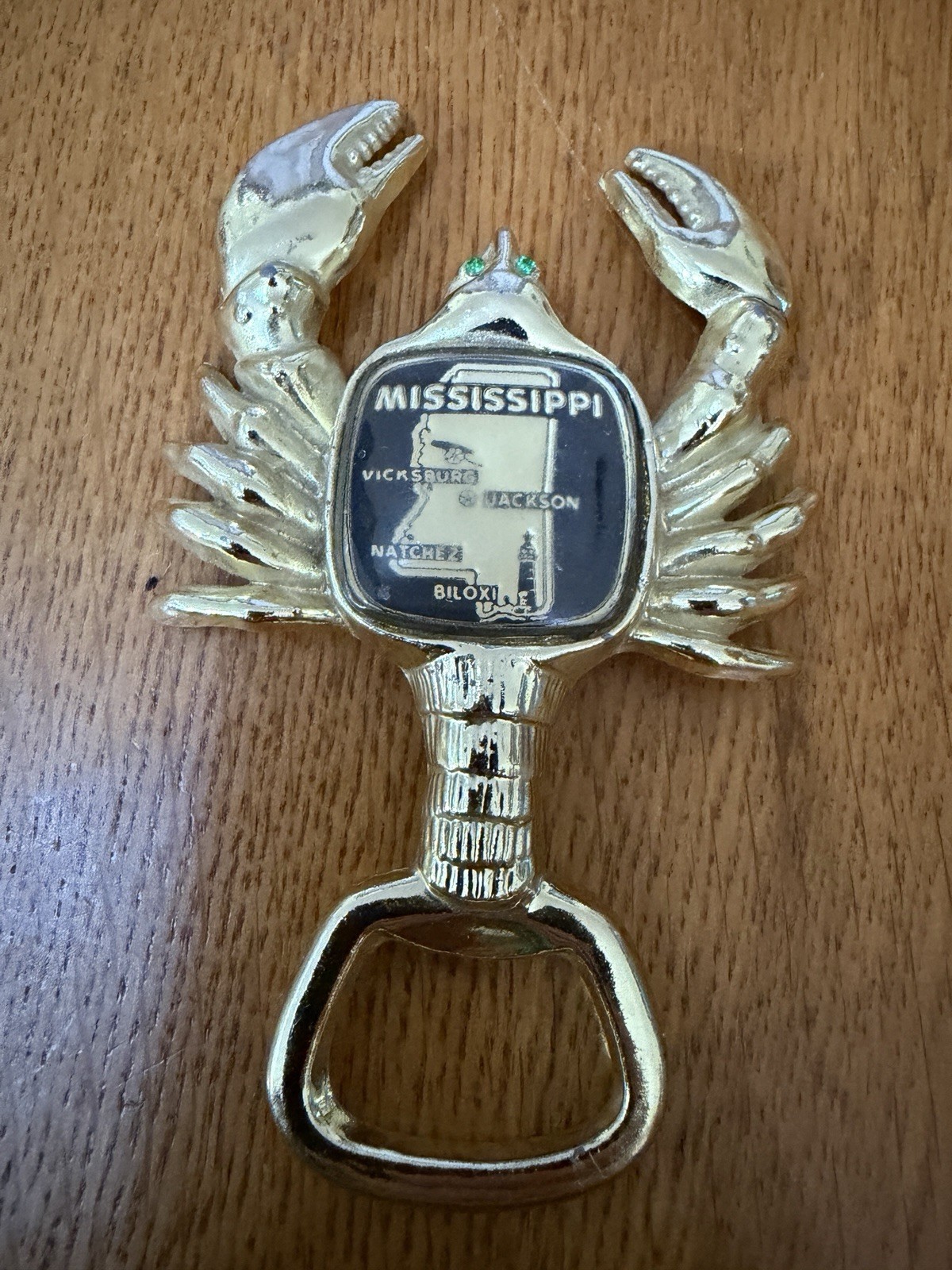 VTG MISSISSIPPI GOLD COLORED BRASS LOBSTER W/GREEN JEWELED EYES BOTTLE OPENER