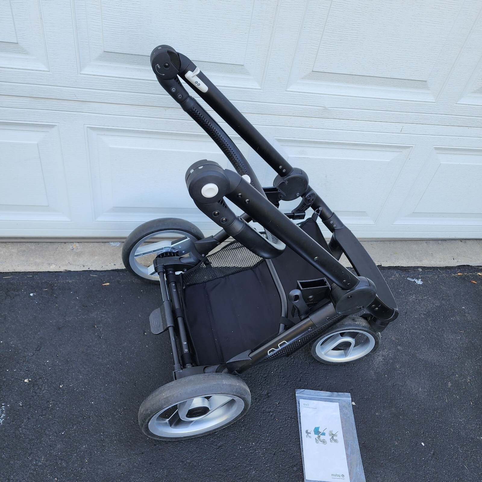 Mutsy Evo Black Stroller Original *Frame +wheels Only* and manual Foldable