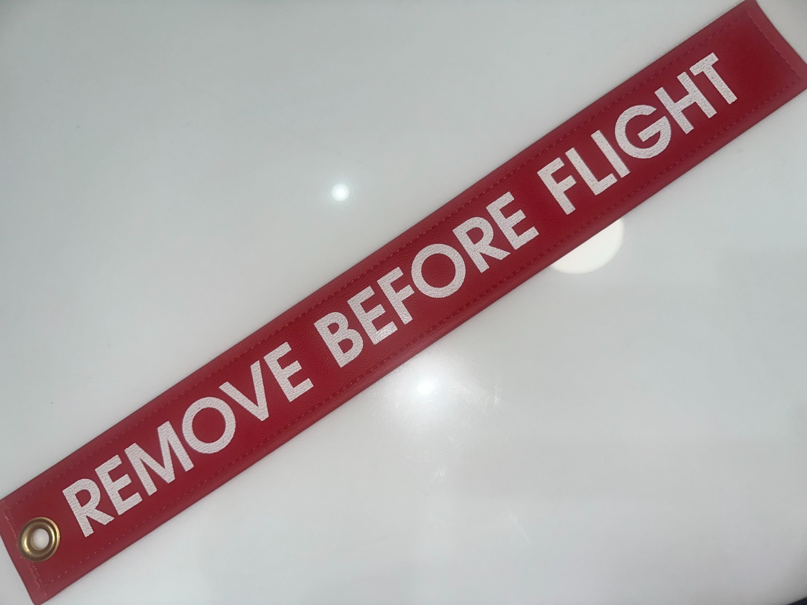 HEAVY DUTY VINYL FLAG w/ REMOVE BEFORE FLIGHT MESSAGE