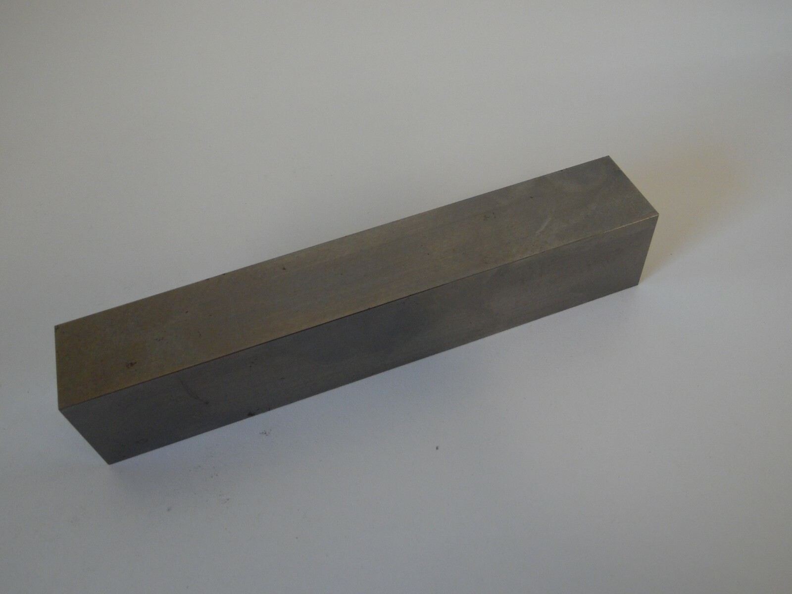 precision ground setup block tapped 1/4 -20 on the ends