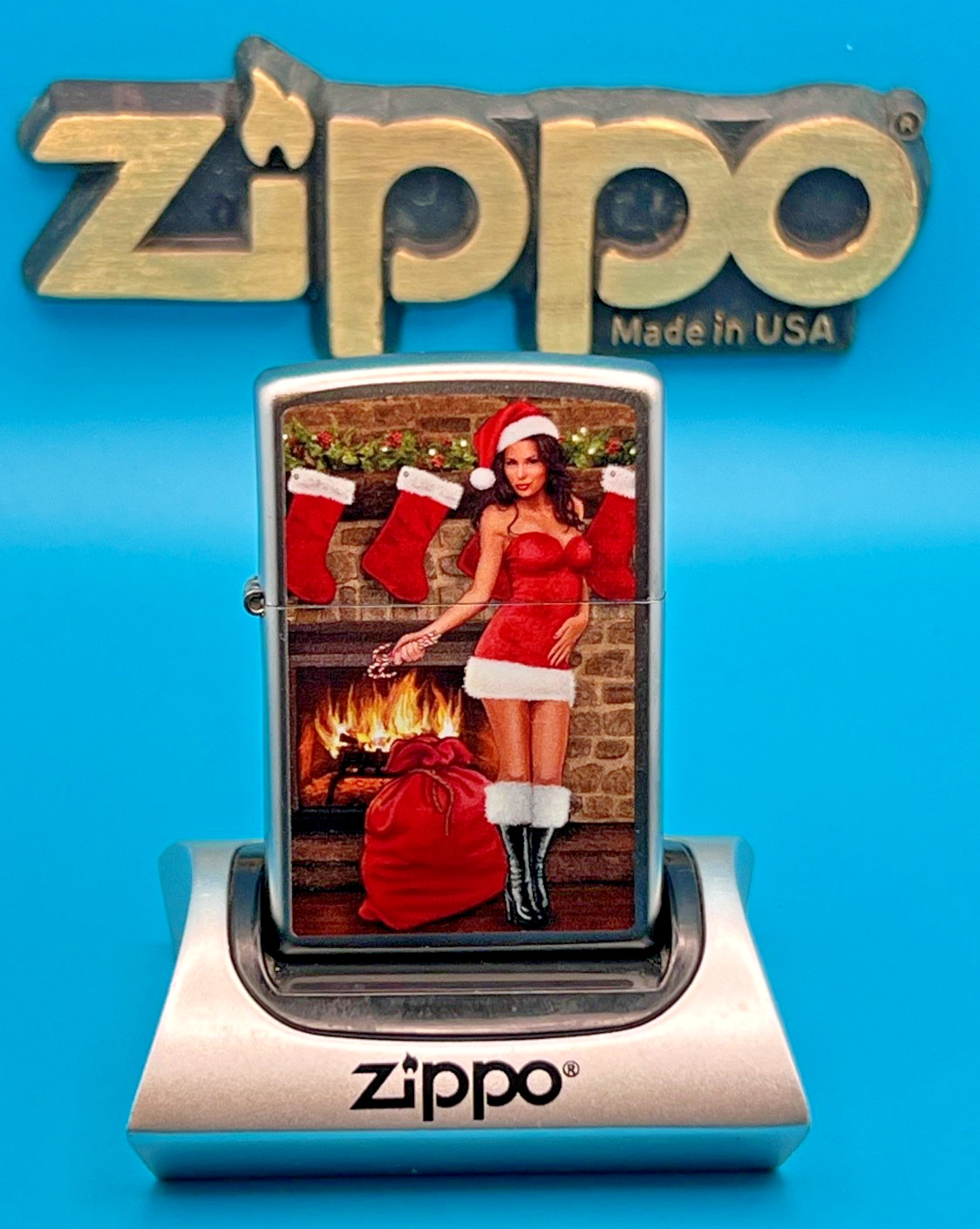 Genuine Brand New 2017 ZIPPO Lighter PULLING A CRACKER BY THE FIRE Satin Chrome