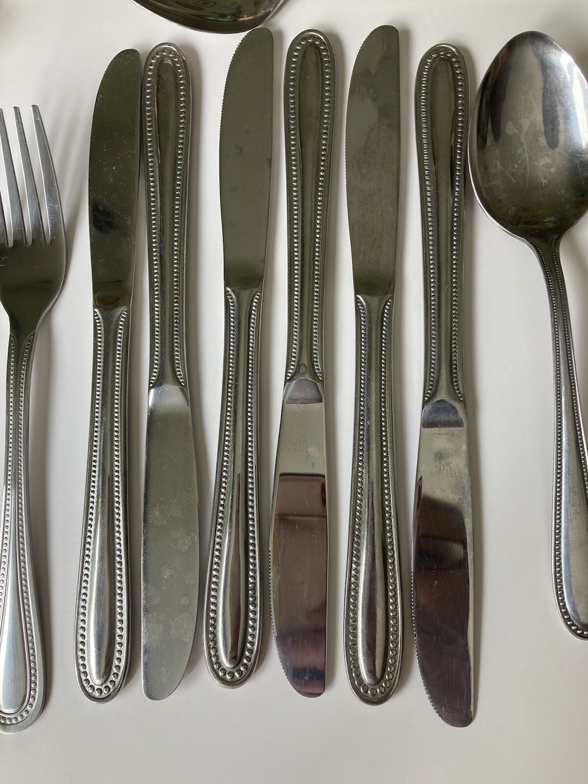 26 Piece “UPDATE” Pattern International Stainless Beaded Heavy Flatware Plus