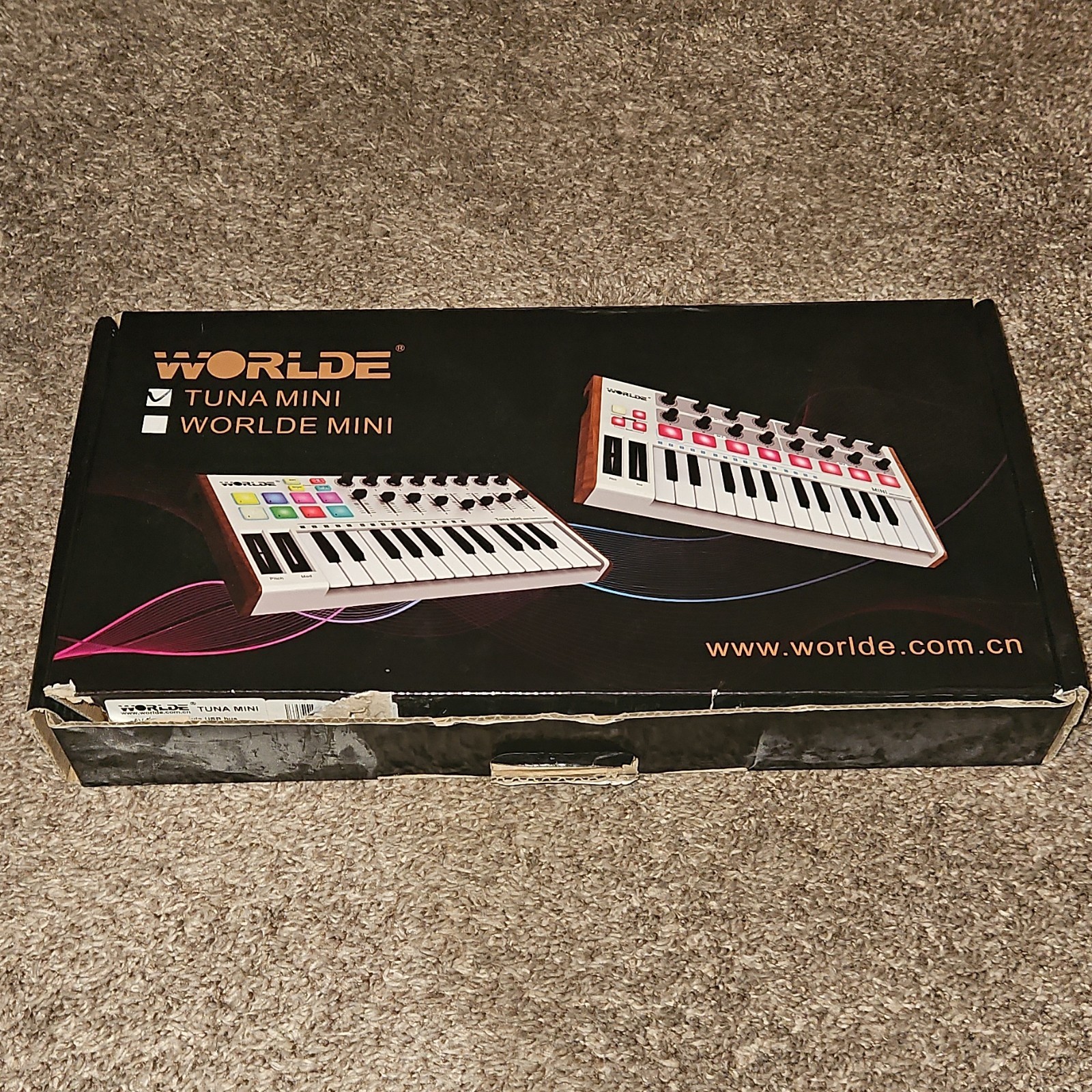 Worlde Tuna Mini 25-Key MIDI Keyboard Controller w/ Pad Triggers, Faders, USB