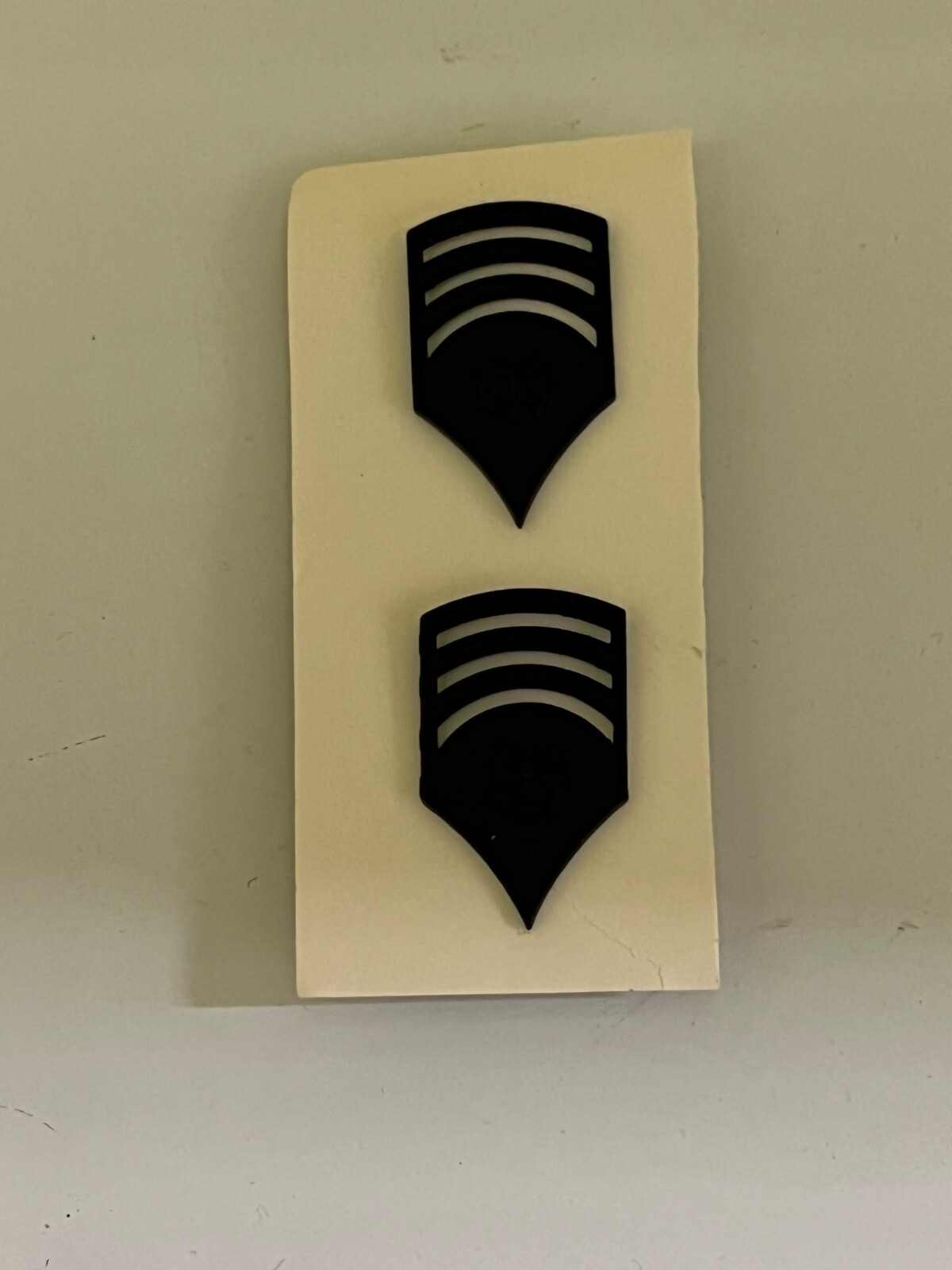 US ARMY SPECIALIST 7TH CLASS PAIR OF ARMY ISSUE BLACK SUBDUED  RANK INSIGNIA
