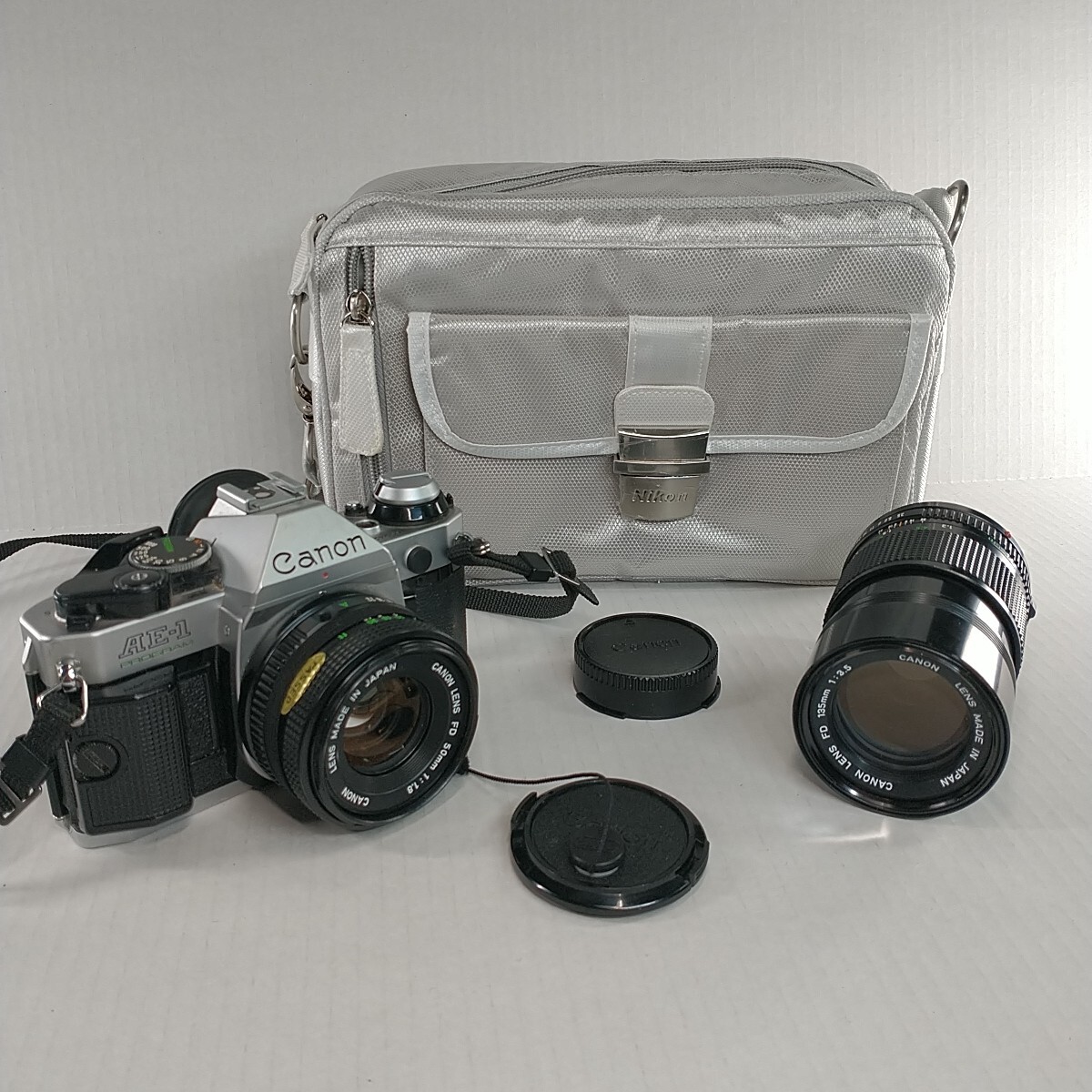 Canon AE-1 Program 35mm Camera Bundle With 50mm / 135 Lens Strap & Camera Bag