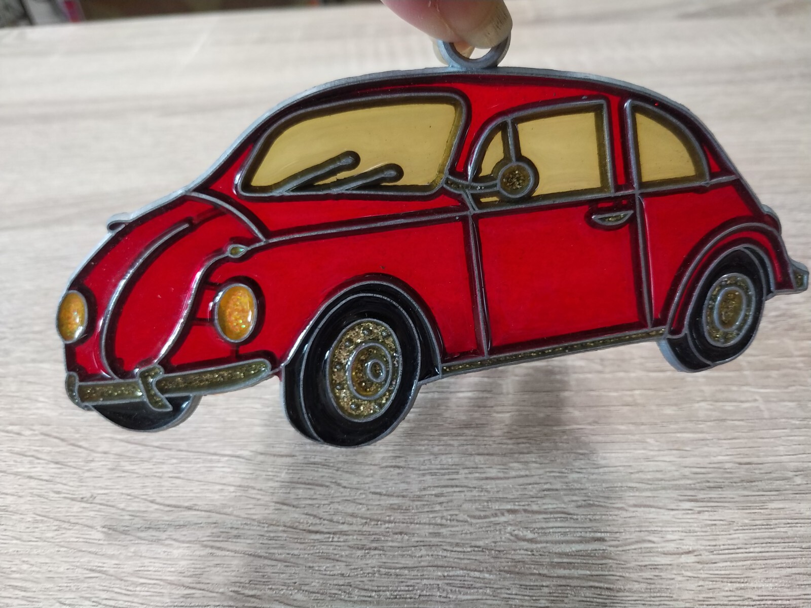 vintage 1980s suncatcher.  RED VOLKSWAGEN BEETLE CAR. PUNCH BUGGY