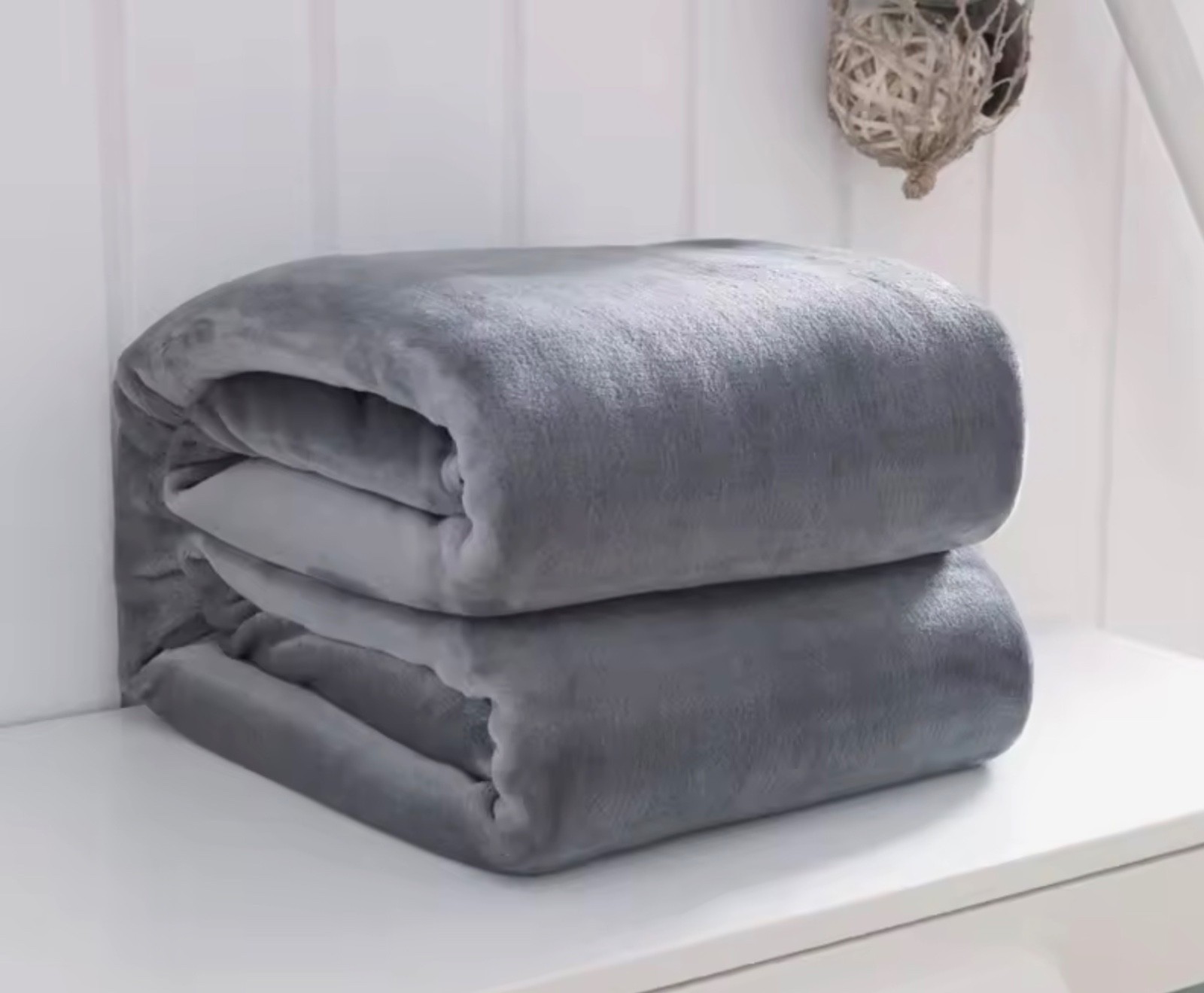 lightweight decorative throw, not electrically heated