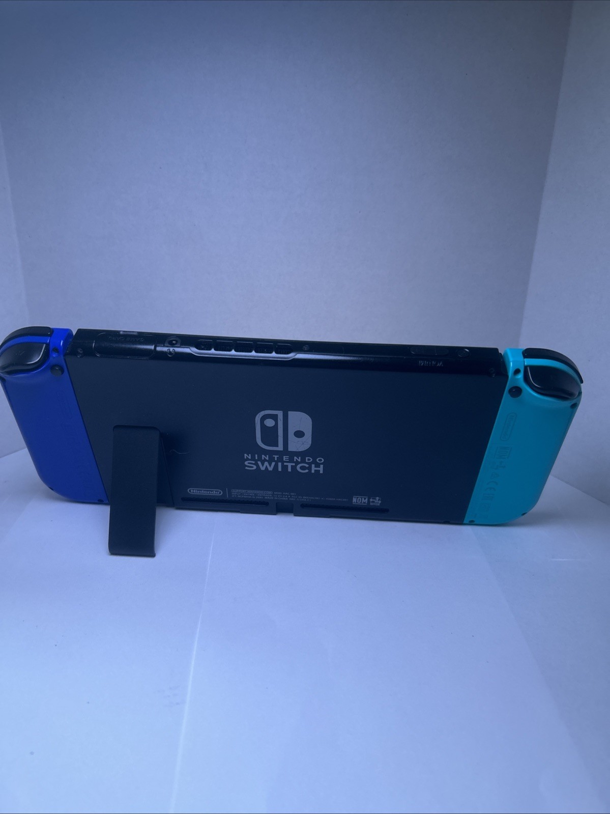 Nintendo Switch Handheld Console + Charger Cord (No Tv Connection Dock )