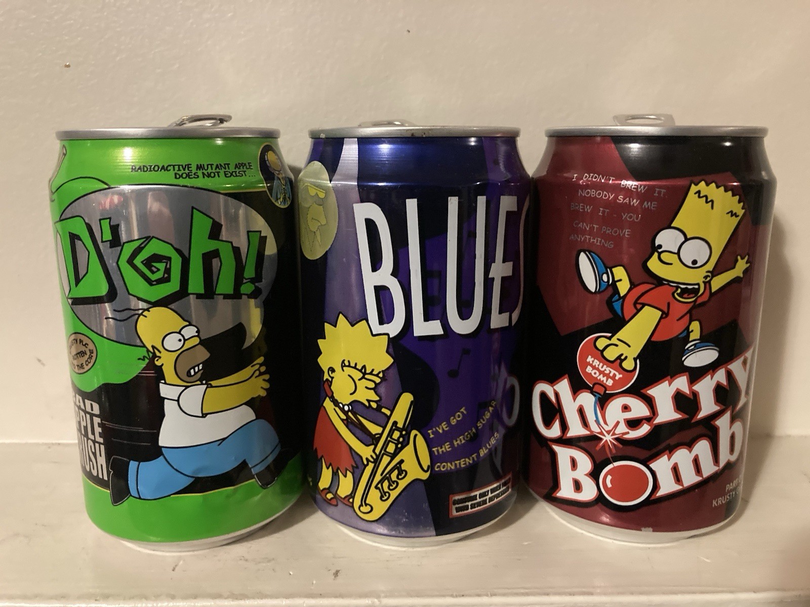 1998 UK The Simpson’s Set Of 3 Empty 330ml Soda Cans. Bart Cherry Bomb & More