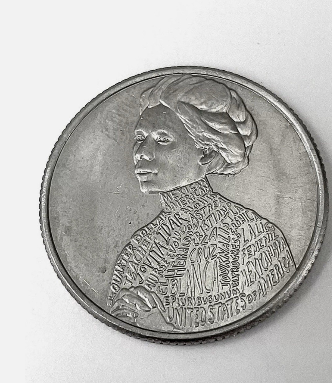 ERROR - 2023 D - Jovita Idar Women's Quarter  Reads “In Cod We Trust”