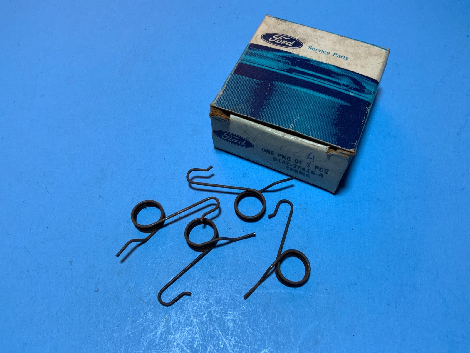 4 pcs. NOS Genuine Ford D1AZ-7E416-A spring