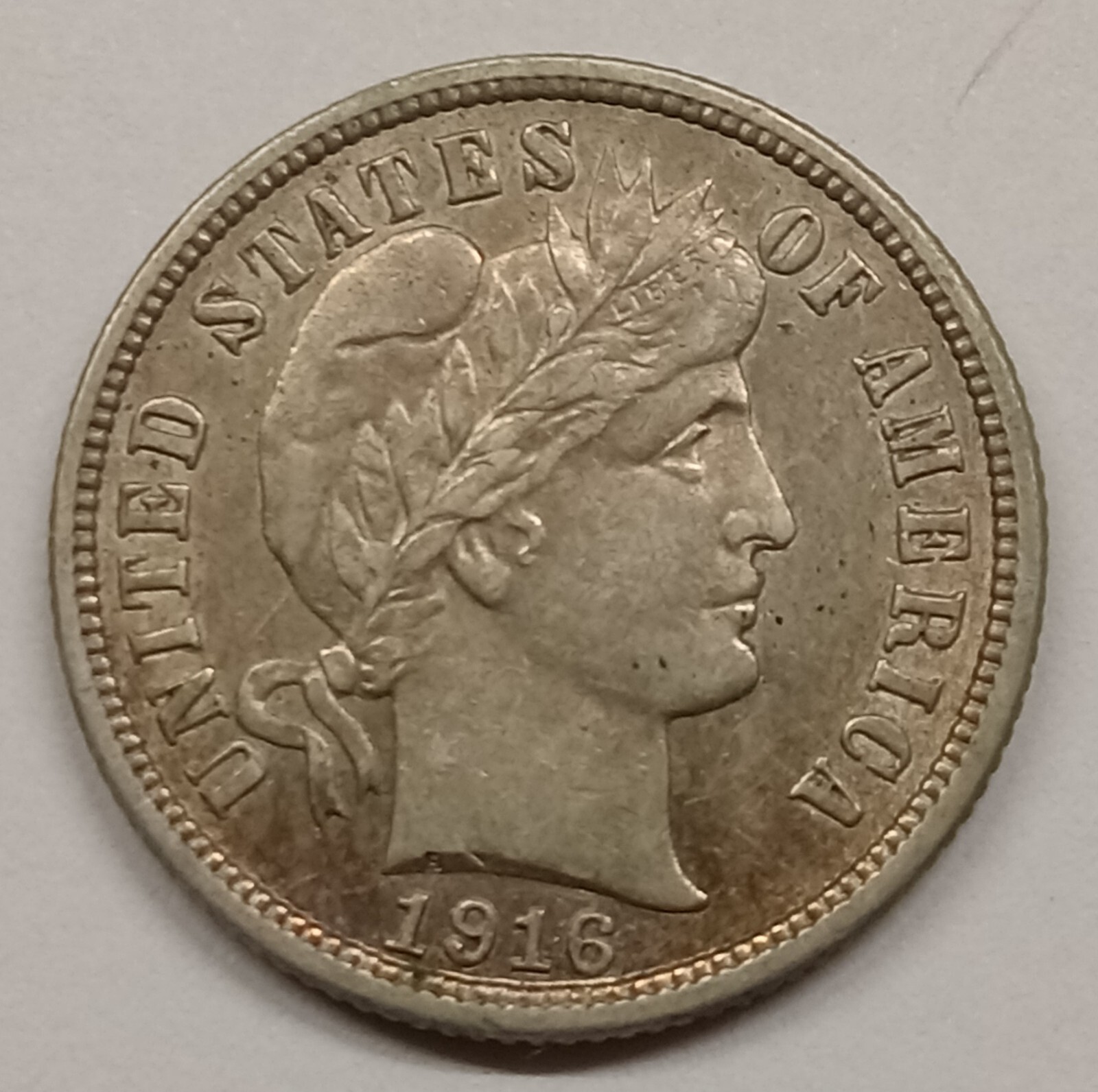 1916 Barber Silver Dime. AU nice surfaces.