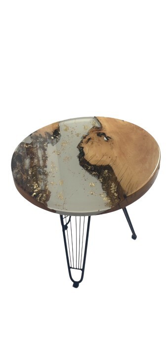 golden river art resin coffee table.