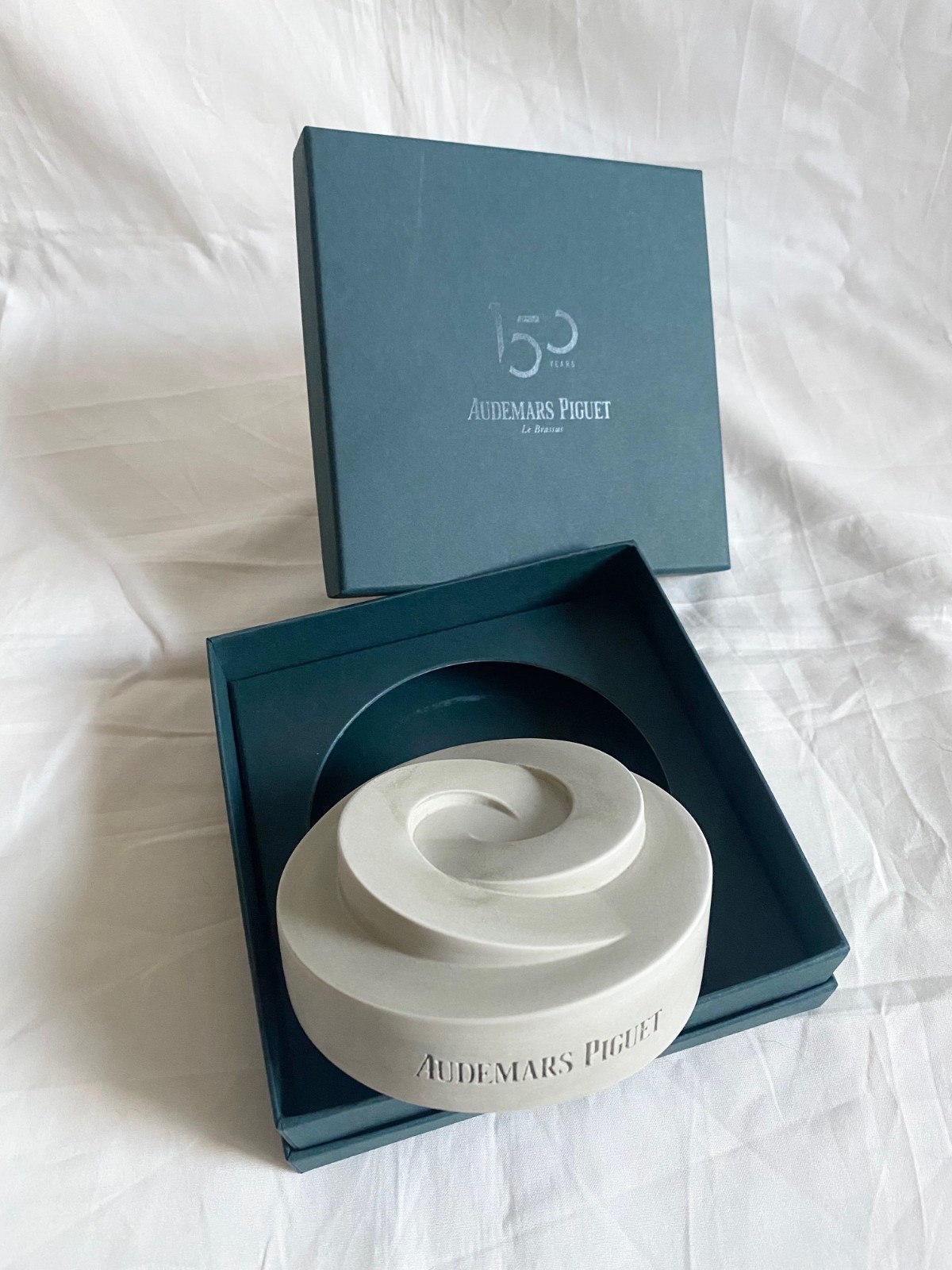 AP 150th anniversary swiss atelier museum cement paper weight new with box