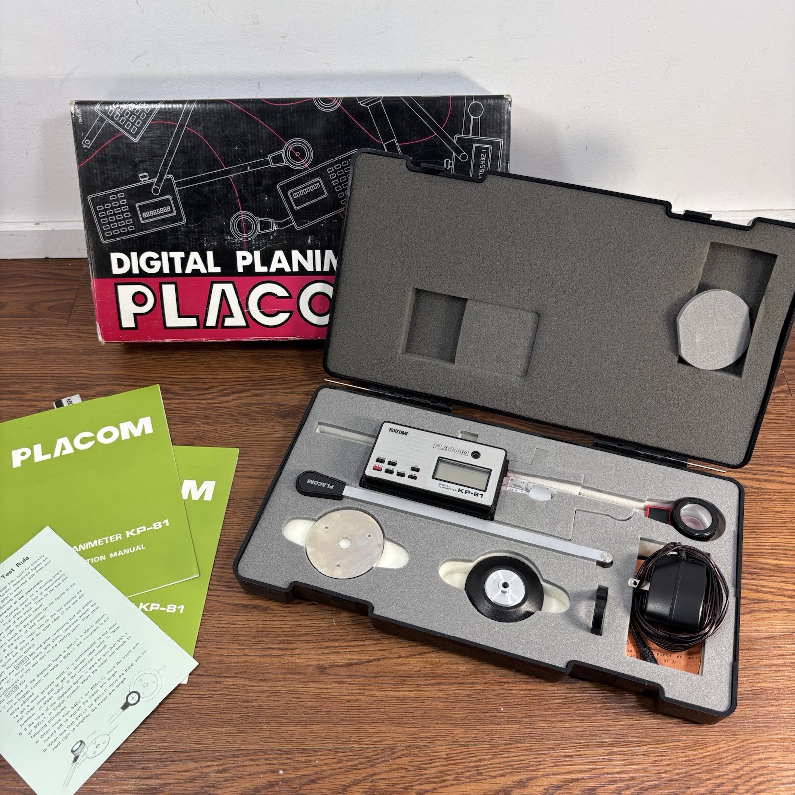Placom Digital Planimeter Model KP-81, Hard Case, Power Adapter, & Manual