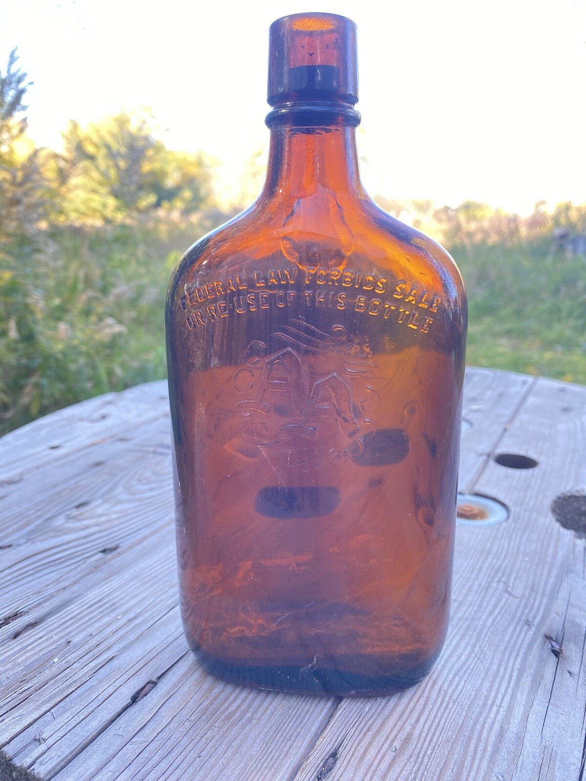 Vintage 1942 AA "Ancient Age" Half Pint Amber Whiskey Bottle. Cork Top, Embossed