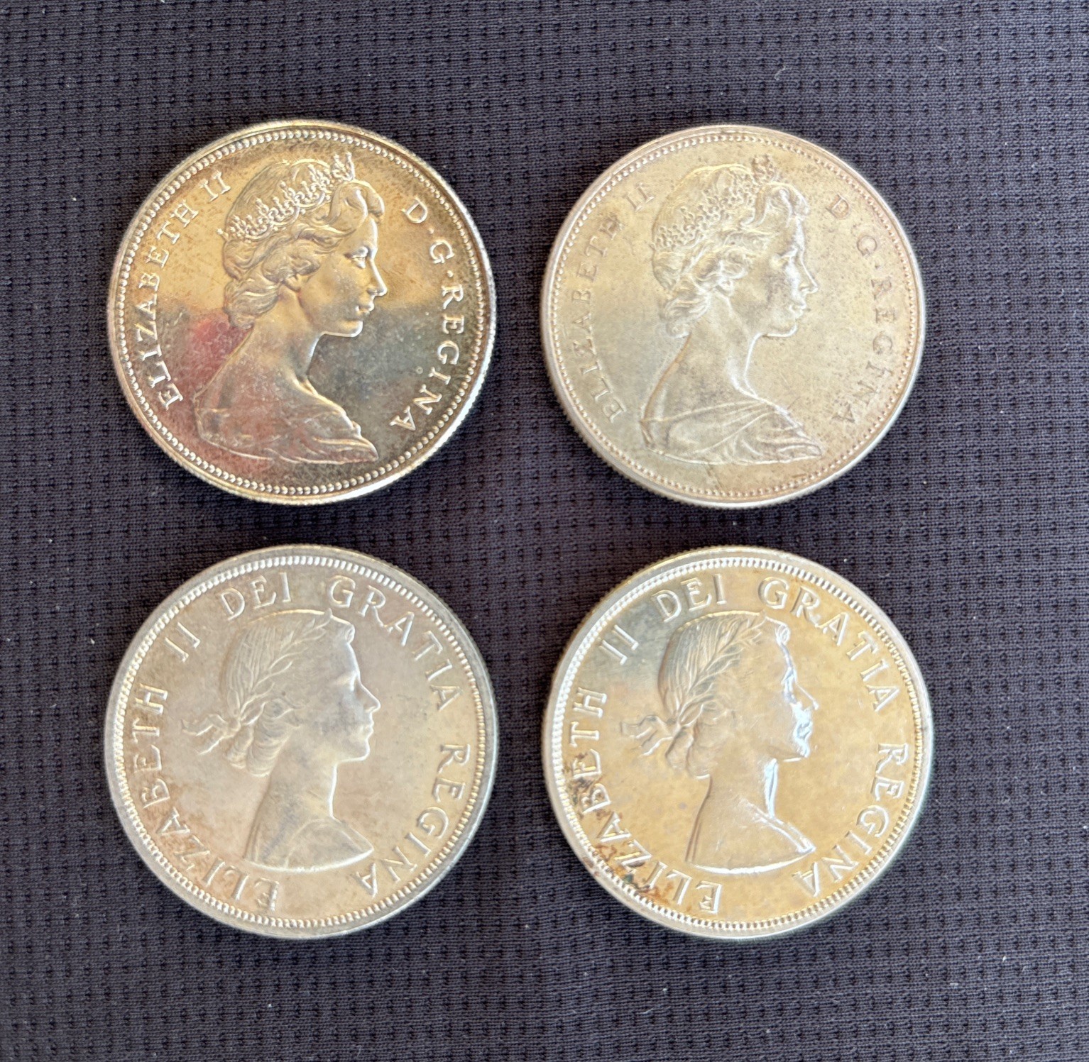 Lot of 4 Canadian Silver Dollars