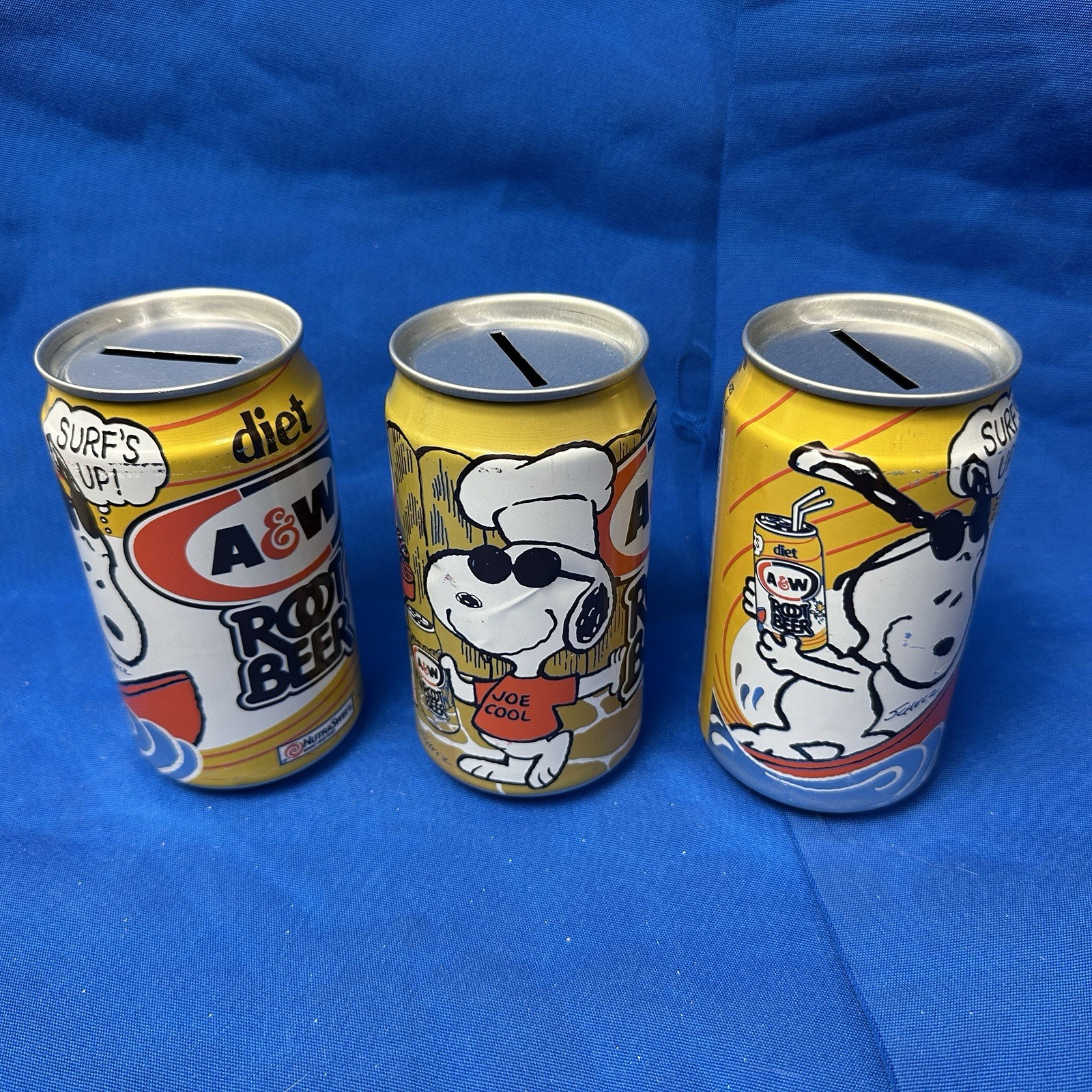 Vintage Snoopy A&W Root Beer Coin Bank Can Lot of 3 Surf’s Up Joe Cool