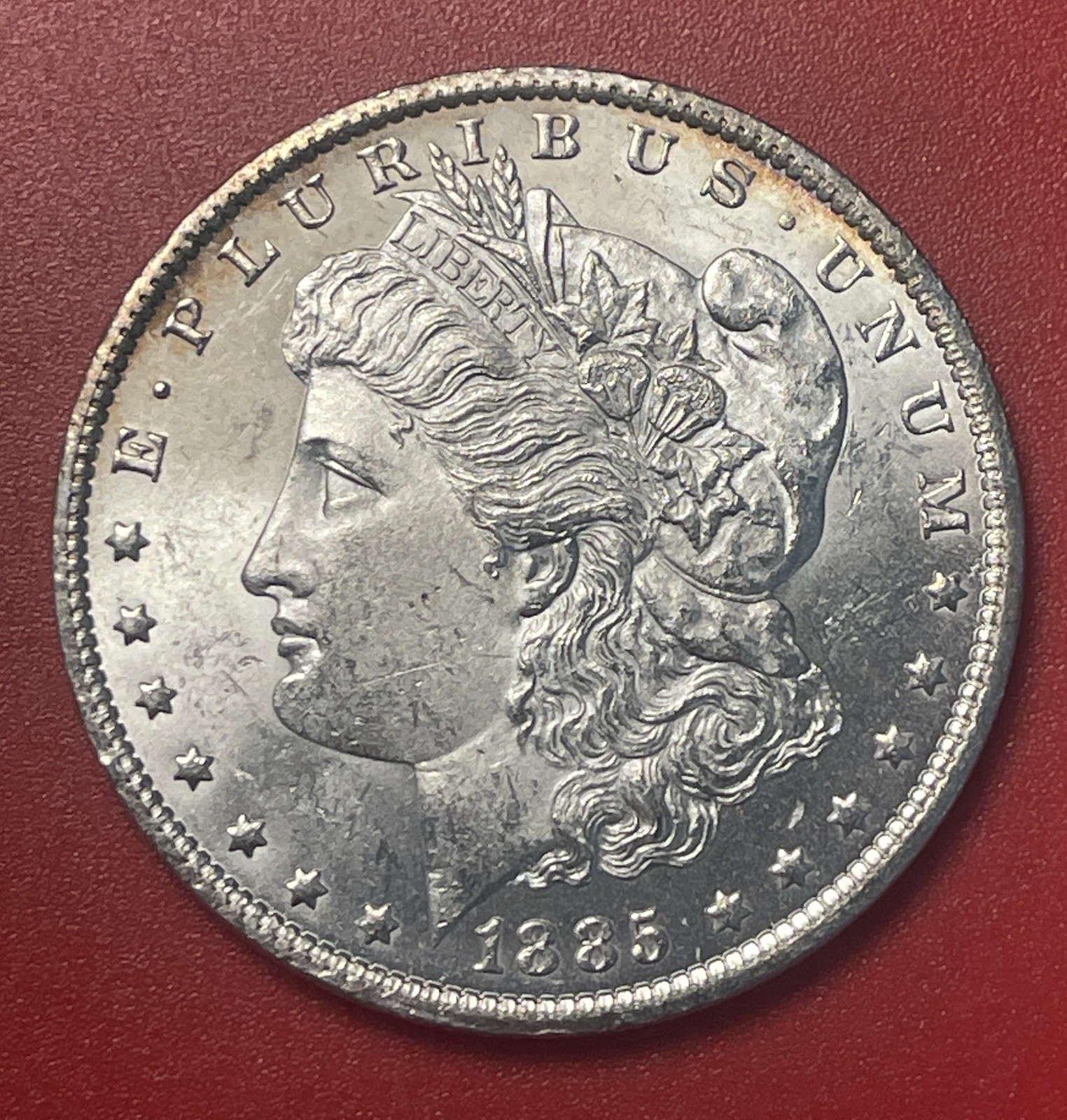 1885 O Morgan Silver Dollar, Choice to Gem Uncirculated.