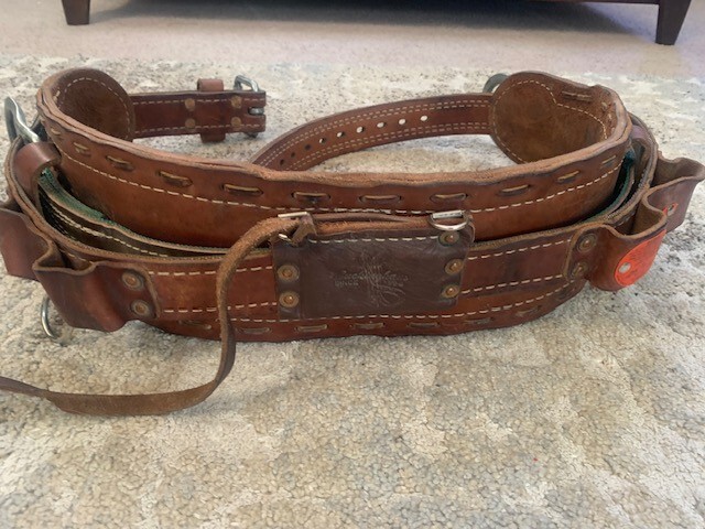 Buckingham Lineman climbing belt 2000 SIZE 28 with tool pouch.