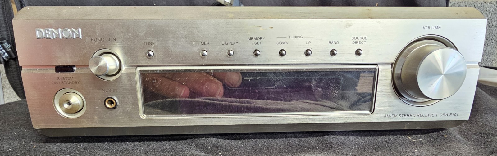 Denon DRA-F101 AM/FM stereo receiver in a silver finish