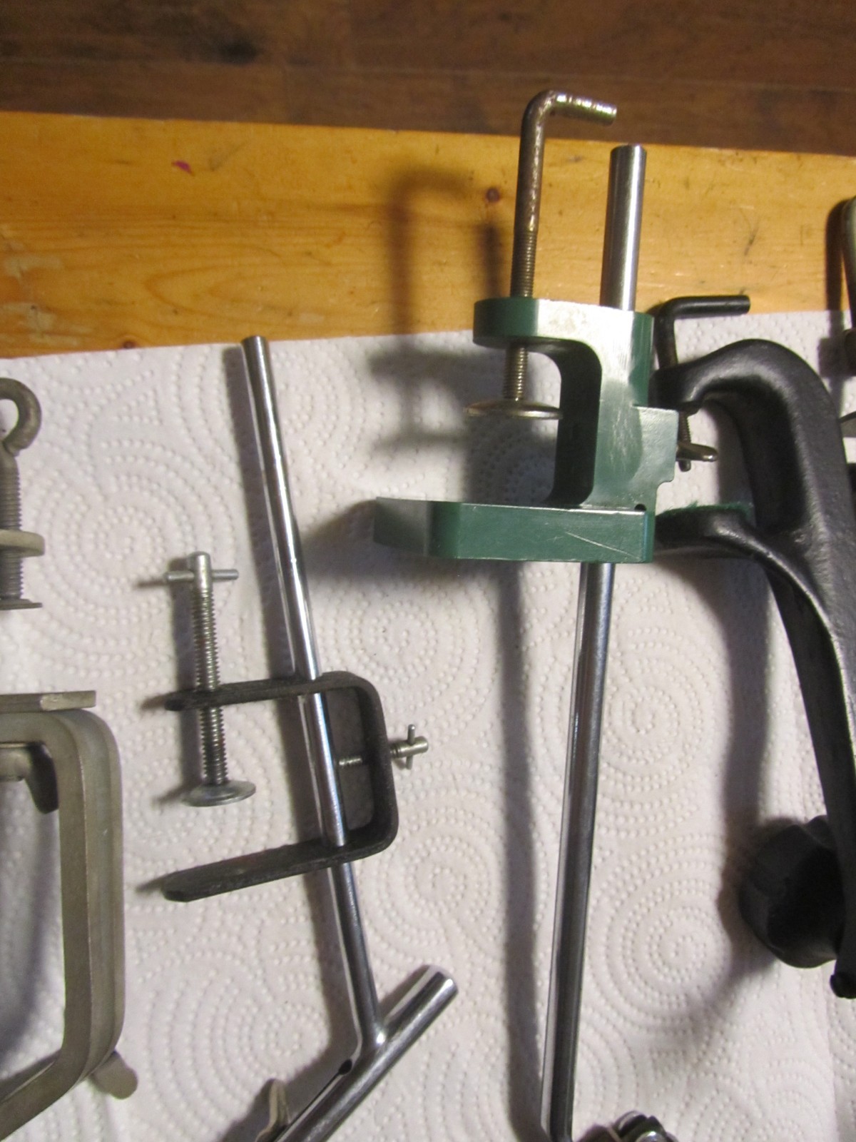 Lot of five fly tying vises shown in pictures