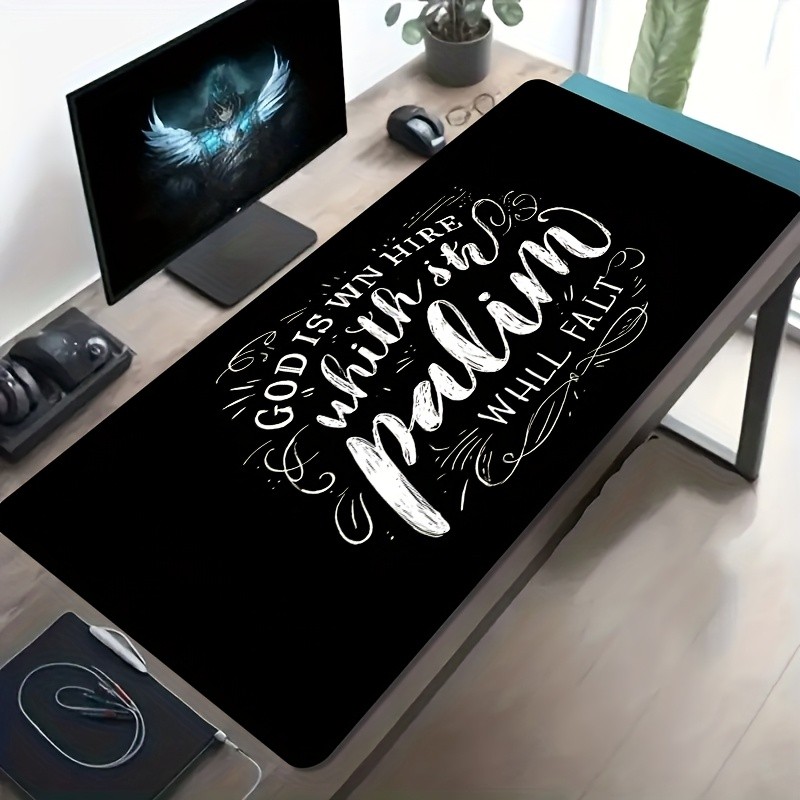 A Large Electronic Sports Gaming Mouse Pad Featuring Black And White Handwritte