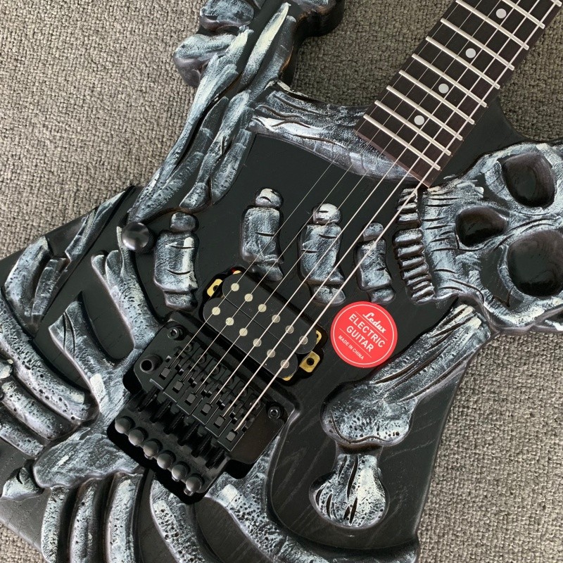 Left Hand Skull Solid Electric Guitar Rounded Fret Edge Maple Neck Hard Rock