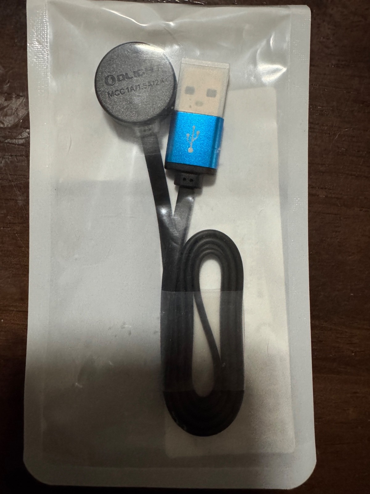 Flashlight Lanyards, O rings and an Olight Flashlight Charger