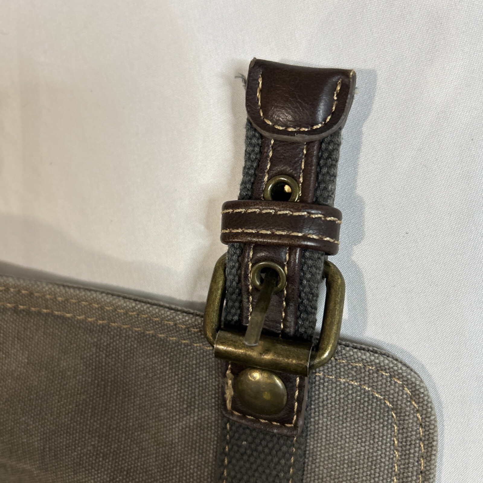 Cargoit Gray Canvas Backpack Magnetic Closures Pockets Straps and A Deep Inside