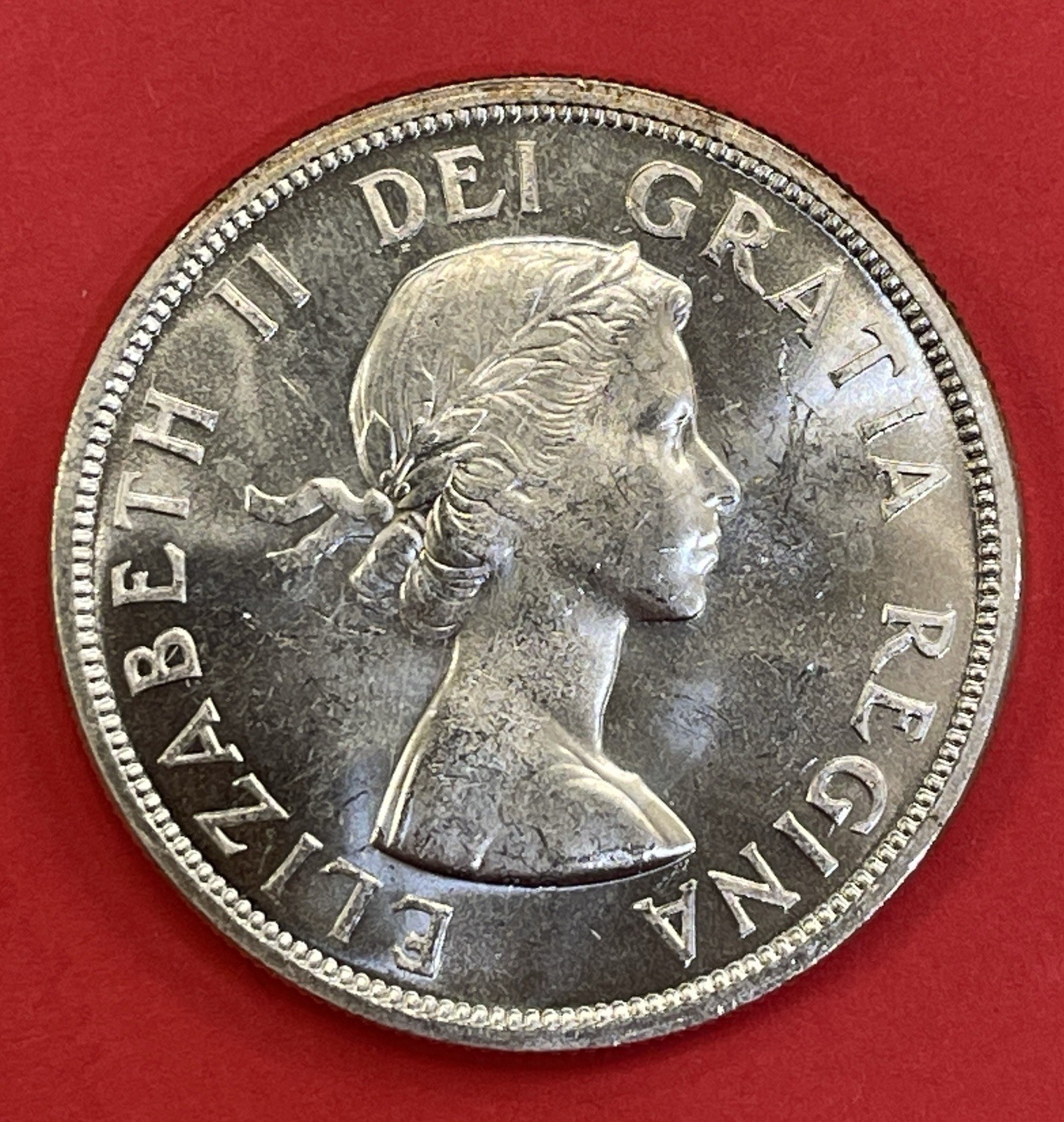 1957 Canada Silver Dollar, Uncirculated. Beautiful Dollar.