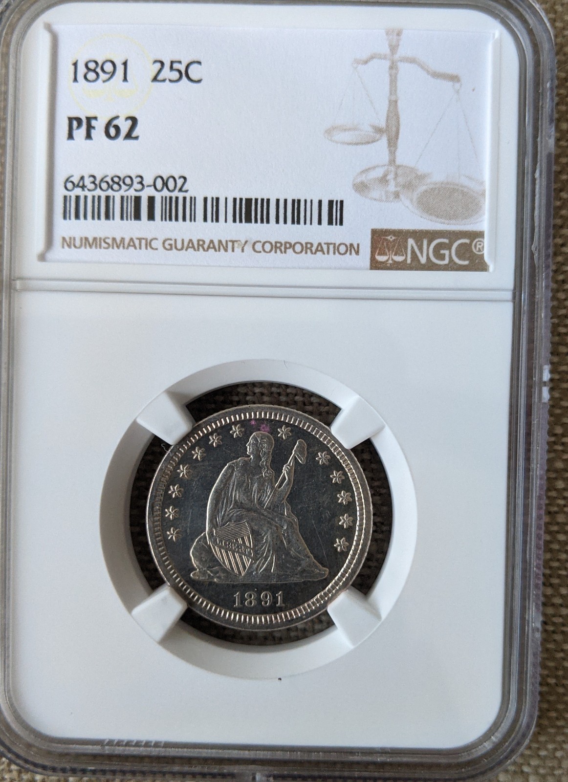 1891 Liberty Quarter. Graded by NCG as Proof 62. Very rare.