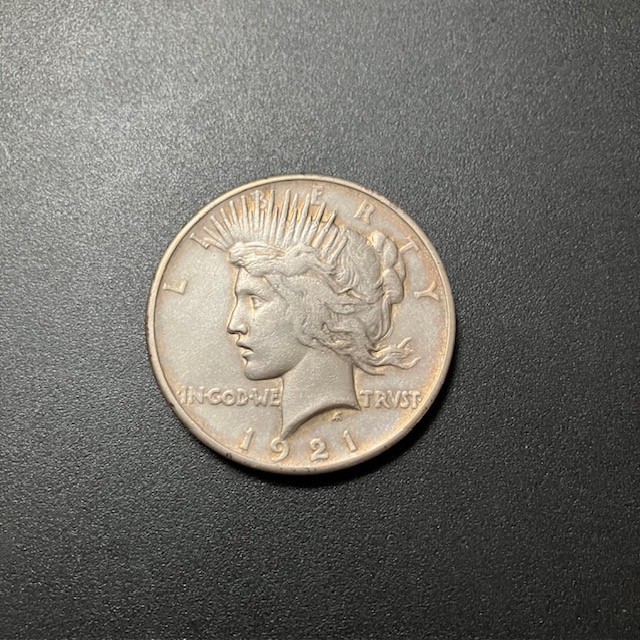 1921 Peace Dollar - EF - Cleaned but re-toned well - Nice Strike