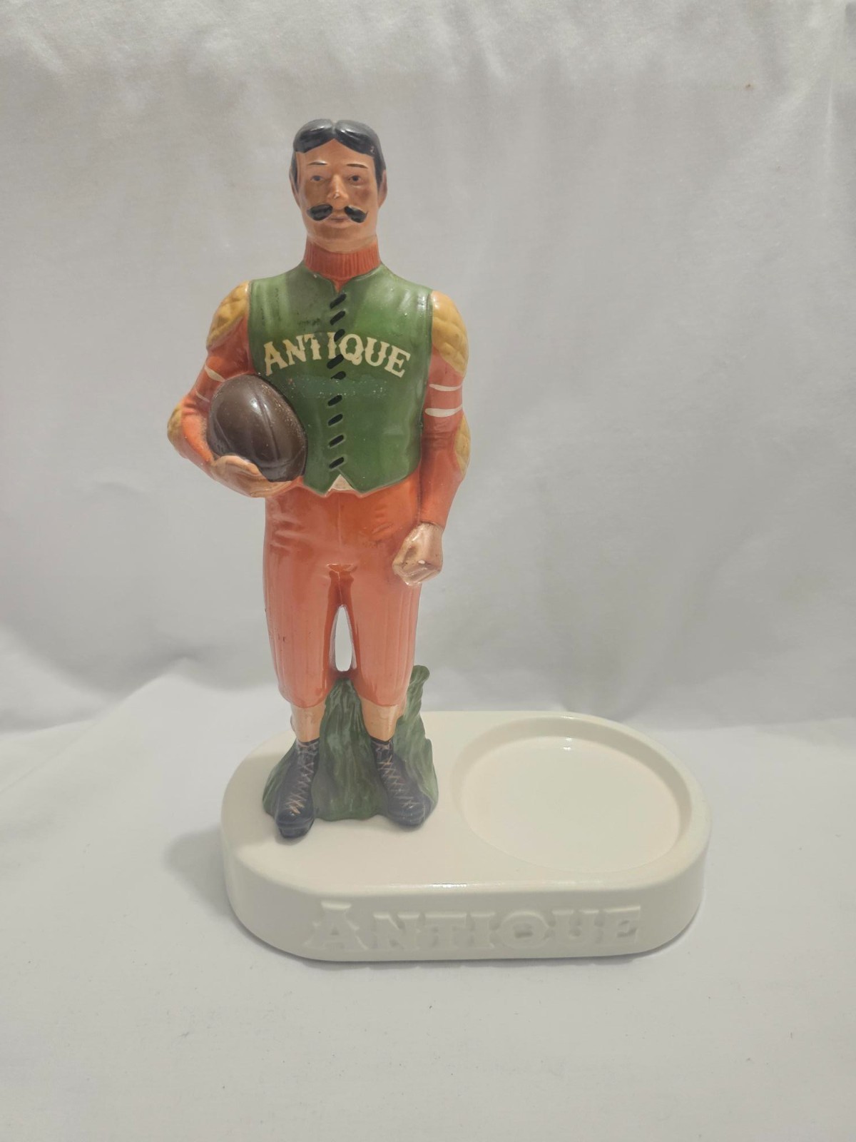 Vintage Antique Bourbon Football Rugby Player Bottle Holder Stand