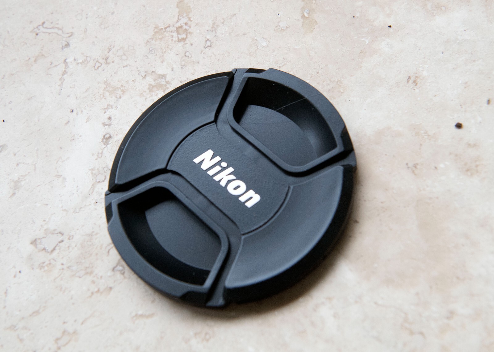 a Nikon LC-82, 82mm snap-on lens caps,.  USA shipping