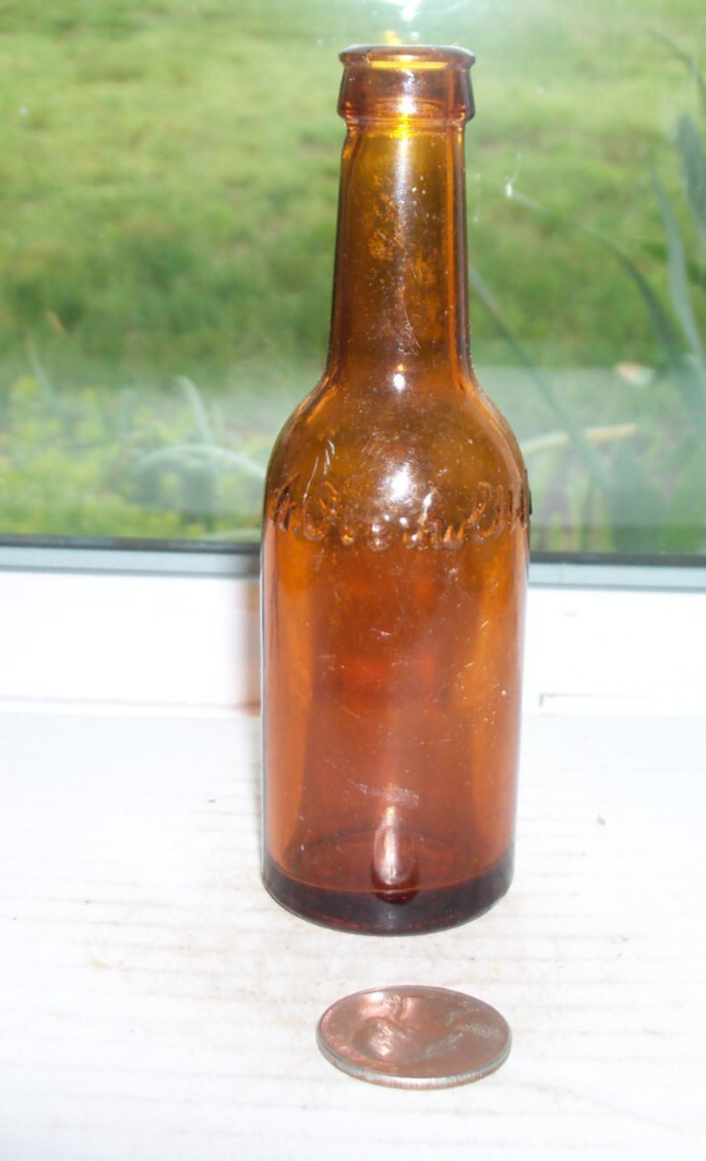 NICE SAMPLE BROWN FANCY LIQUOR BOTTLE EMBOSSED, A. IVERHOLH CO