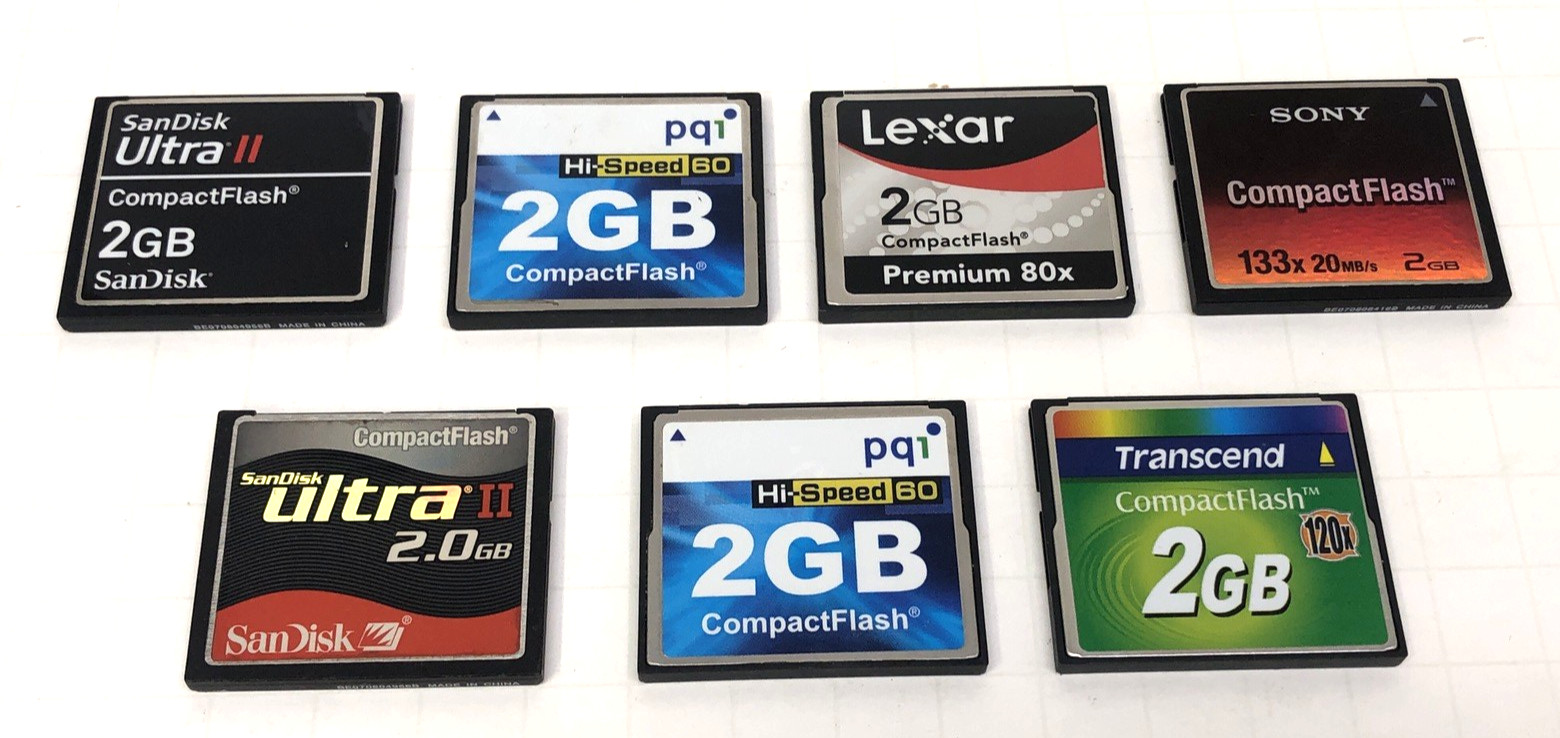 SEVEN ASSORTED 2GB COMPACT FLASH MEMORY CARDS