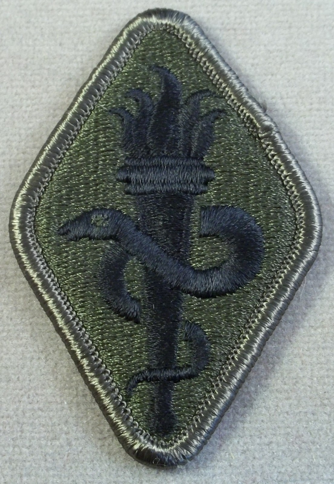 US Army Medical Center And School Subdued Merrowed Edge Patch NOS 1997