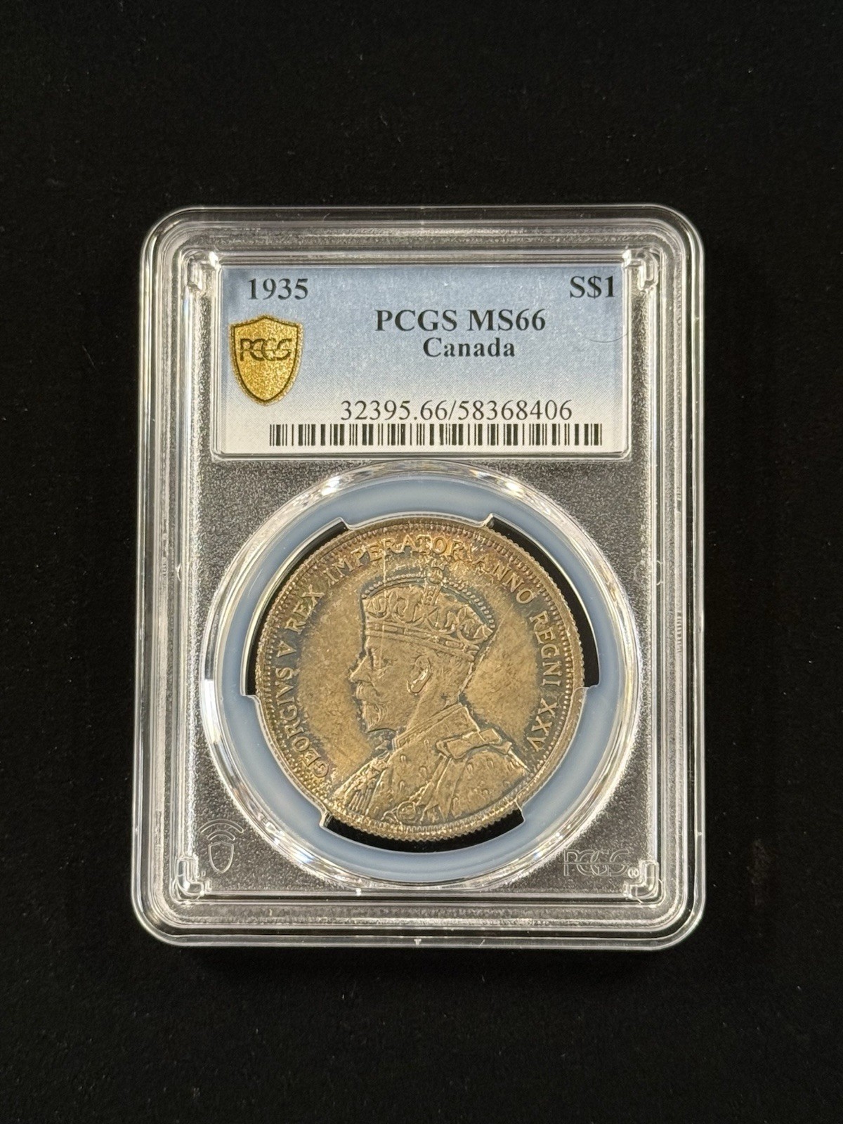 1935 $1 Canada Silver Dollar Awesome Rainbow Toned PCGS MS66 Item #983