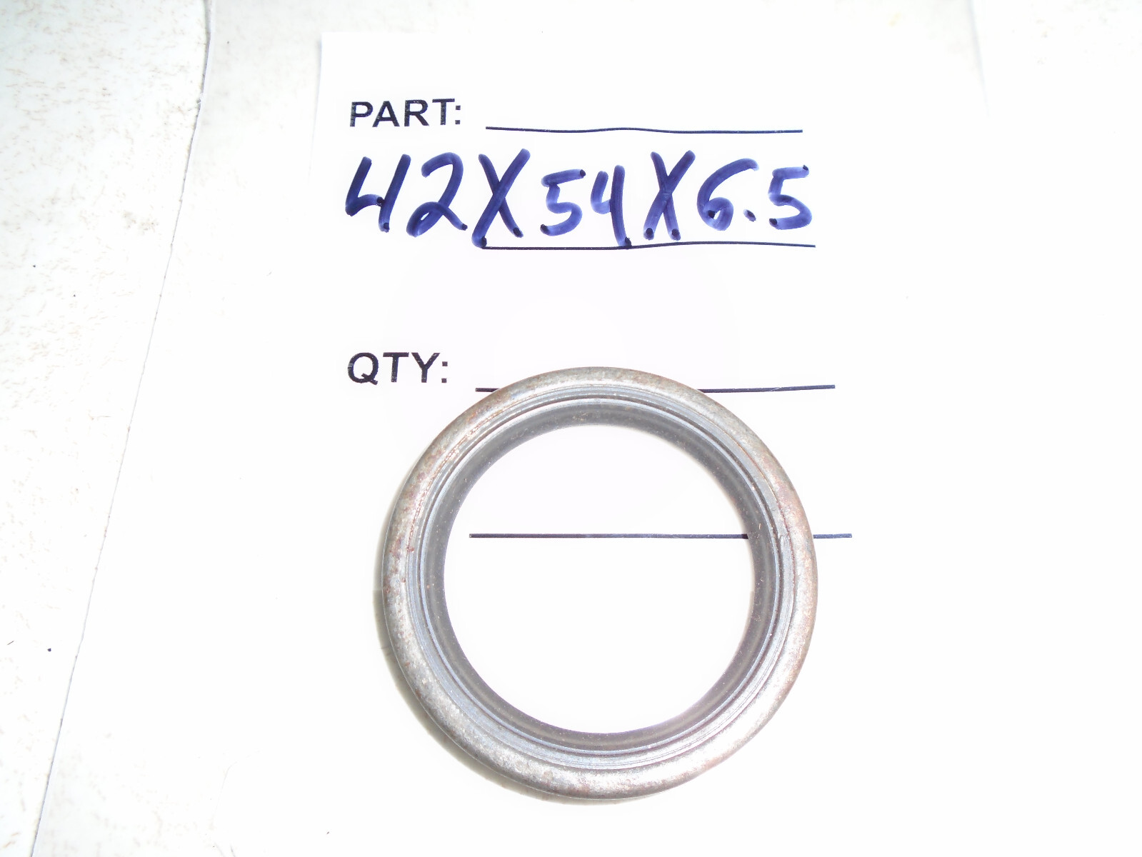 TC 42X54X6  METRIC OIL / DUST SEAL 42mm X 54mm X 6mm WITH SPRING