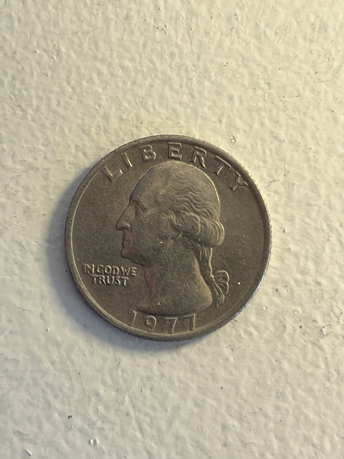 1977 Washington Quarter no mint Circulated (LIBERTY & DATE) touching rim