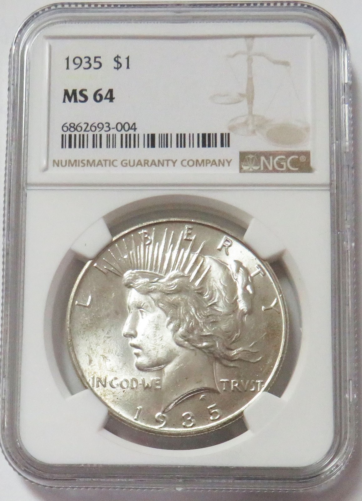 1935 PEACE SILVER DOLLAR $1 COIN NGC MINT STATE 64