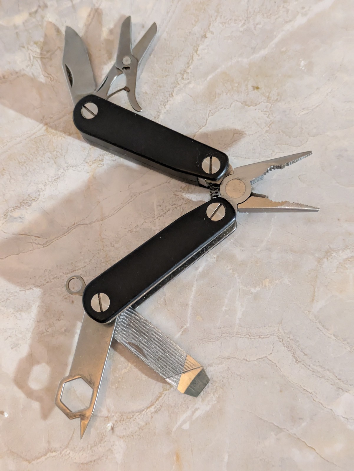 Black STRIKE KING Multi-Tool with Pliers File Scissors & More