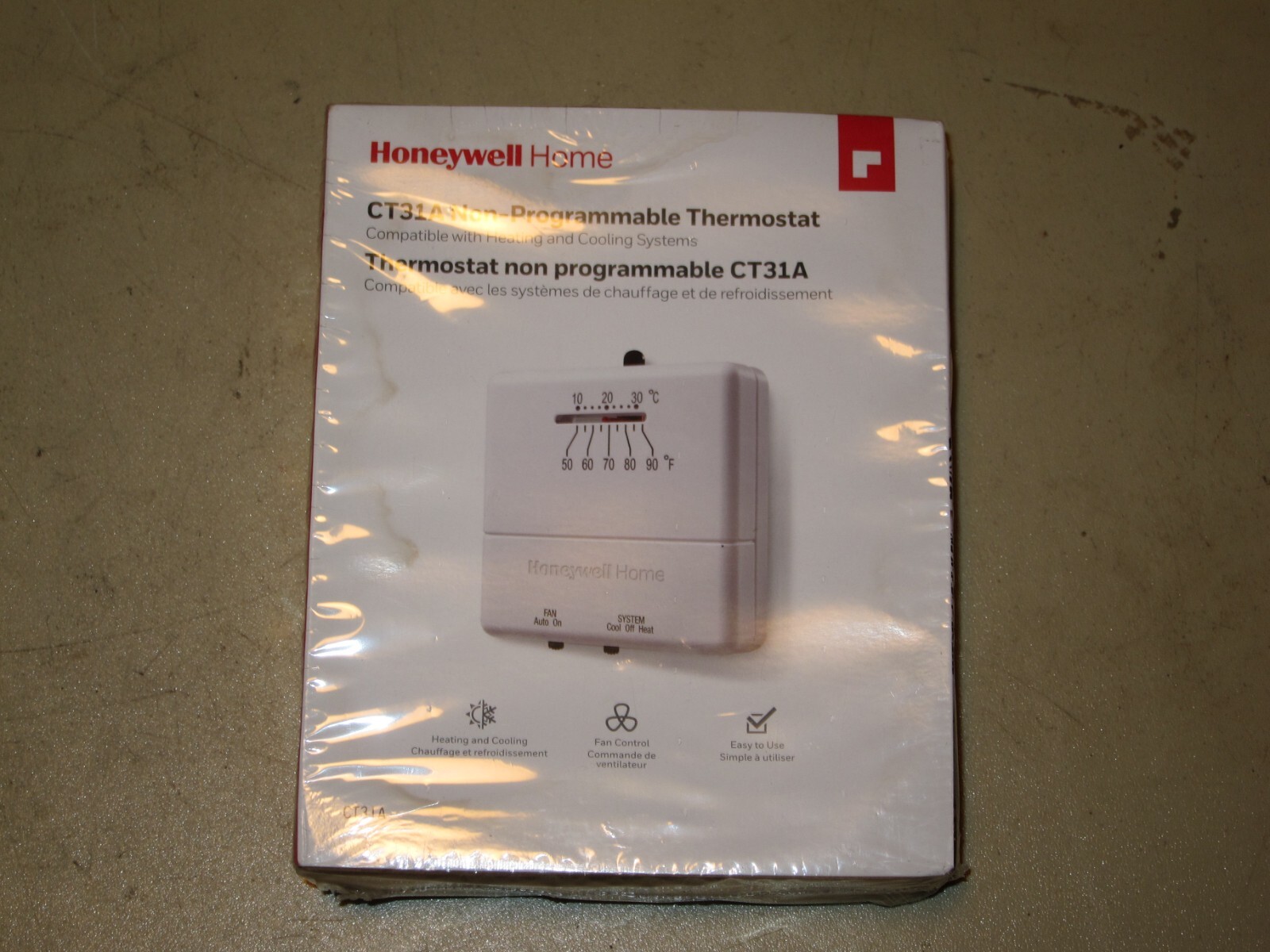 New Honeywell Home CT31A1003 Heat/Cool Non-Programmable Thermostat, Damaged box
