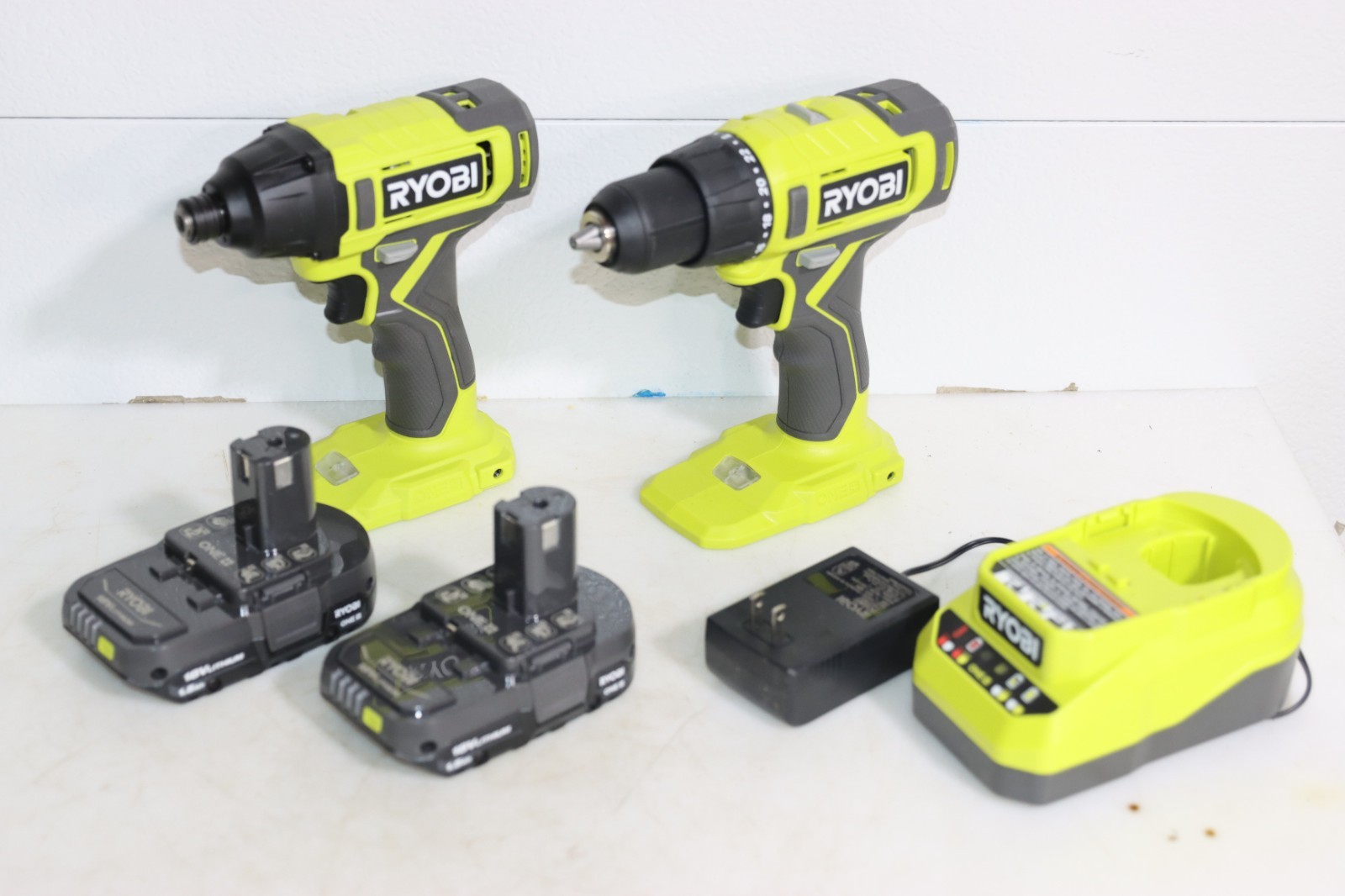 Ryobi One+ 18V 1/2 in Drill Driver 1/4 in Impact 2 1.5 Ah Batteries (PCL1200K2)