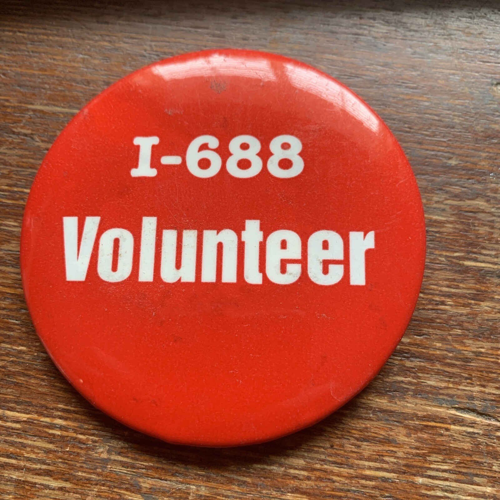 1-688 Volunteer Pinback Button Adv